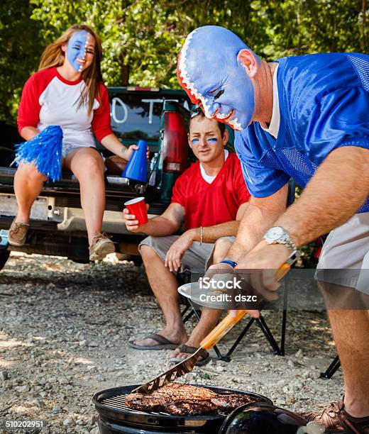 Young Adult College Football Fans Tailgating With Barbeque Grilled Food Stock Photo - Download Image Now