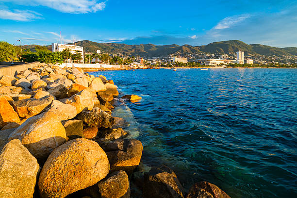 Braking waves at the cliffs La Quebrada area in Acapulco
