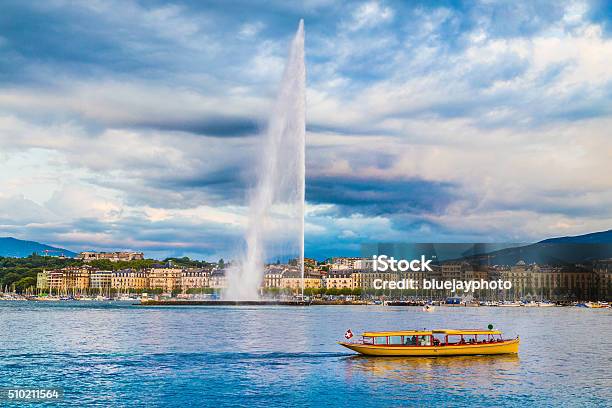 City Of Geneva With Jet Deau Fountain At Sunset Switzerland Stock Photo - Download Image Now