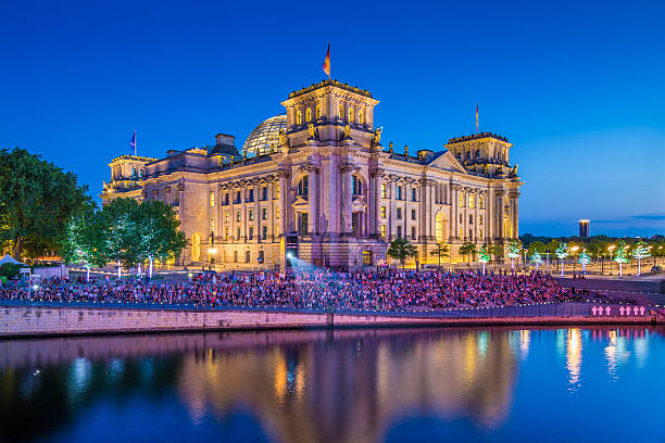istock Reichstag building with Spree river at night, Berlin, Germany 510211778