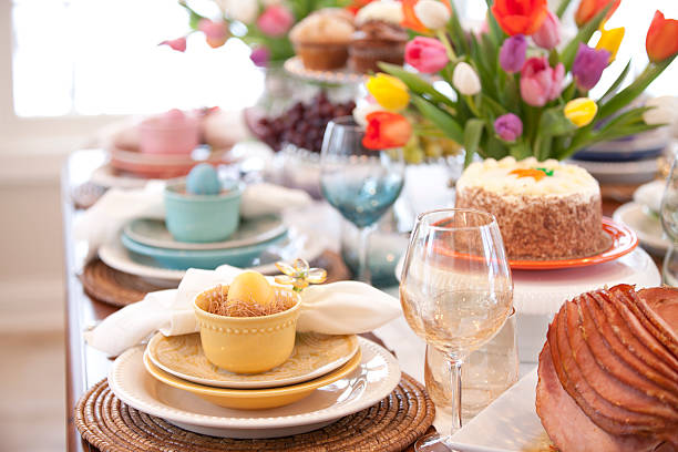 istock Easter Elegant Place Setting Dining Table with Vase of Tulips 510212464