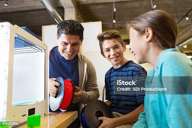 Children Learning How To Use 3d Printers In Makerspace Studio Stock Photo - Download Image Now