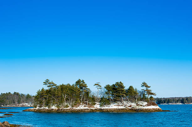 Island off Wolfe's Neck State Park, Freeport, Maine in winter stock photo