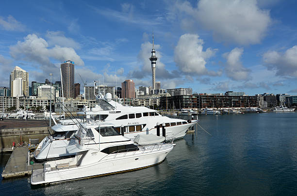 Yachts mooring at Auckland Viaduct Harbor Basin Auckland, New Zealand - August 1, 2015: Yachts mooring at Auckland Viaduct Harbor Basin.It's a former commercial harbor turned into a development of upscale apartments, office space and restaurants. Waitemata Harbor stock pictures, royalty-free photos & images