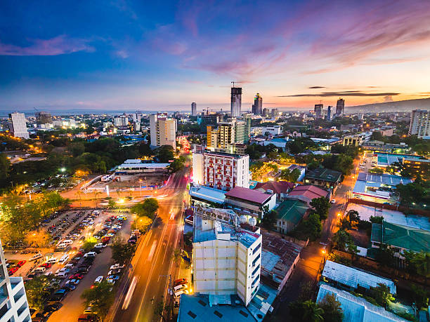 Cebu City skyline during sunset Cebu, Philippines - April 19, 2015: Cebu City skyline during sunset in Cebu, Philippines cebu province stock pictures, royalty-free photos & images