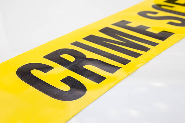 istock word 'crime' on crime scene tape 510219194