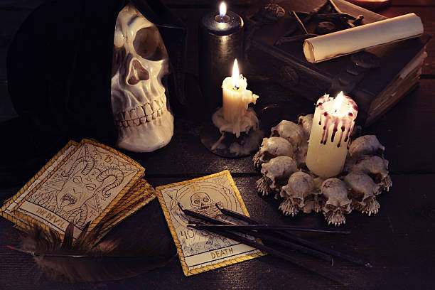 Mystic Close Up Of Skull Candle And The Tarot Cards Stock Photo