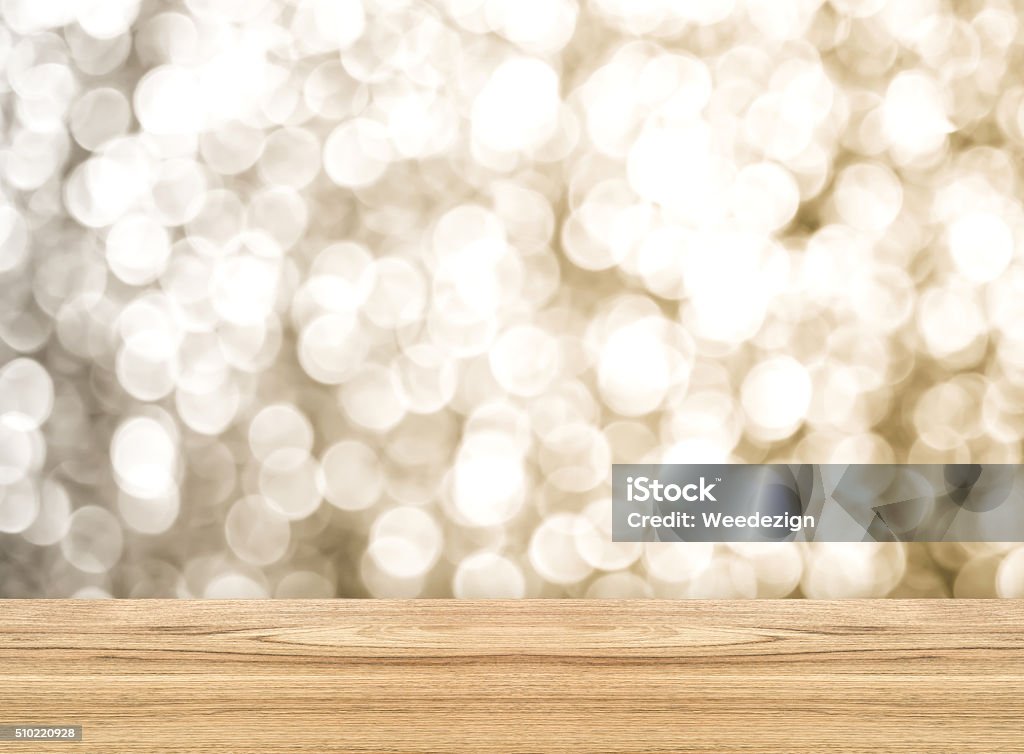 Empty perspective room with sparkling bokeh wall and wooden Empty perspective room with sparkling bokeh wall and wooden plank floor,Template mock up for display of your product. Anniversary Stock Photo