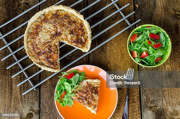 French Quiche With Cheese And Salad Stock Photo - Download Image Now - Arugula, Baked, Baked Pastry Item