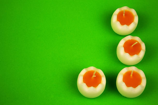 istock Easter candles on a green background 510226988