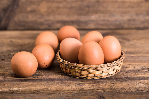 istock chicken eggs on wooden background 510227648