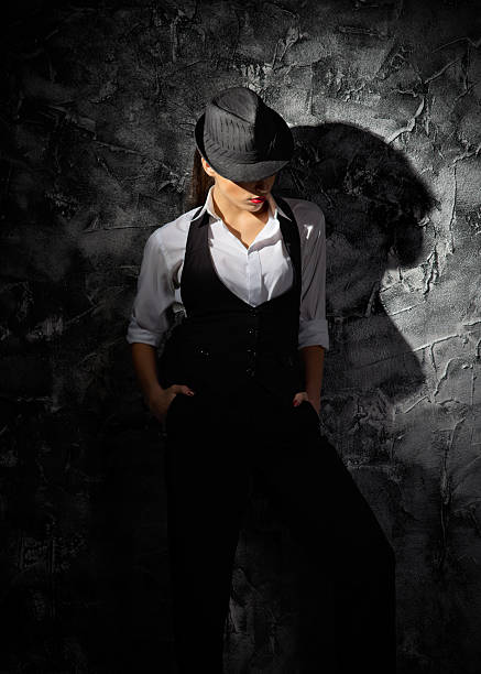 istock Woman with hat on grey wall 510227677