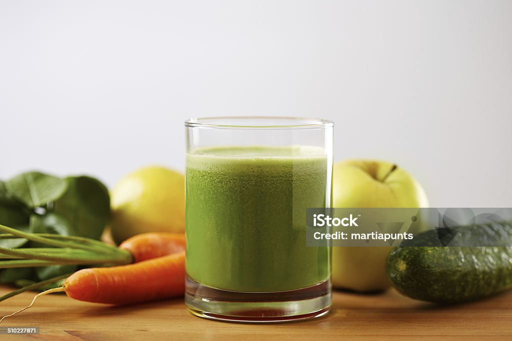 Homemade vegan green juice Homemade vegan green juice with fruit and vegetables Apple - Fruit Stock Photo