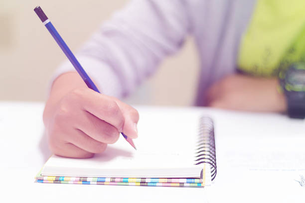 istock front view of writing hand 510228086
