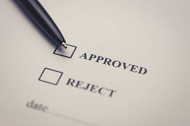 istock Approved and reject stamp with pen on white paper 510229944