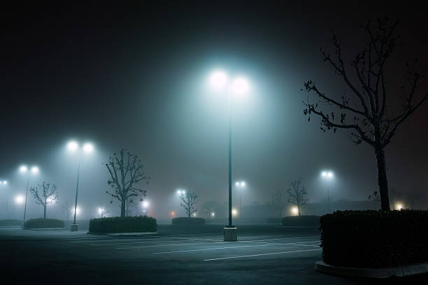 istock foggy night parking lot - 1 510229986