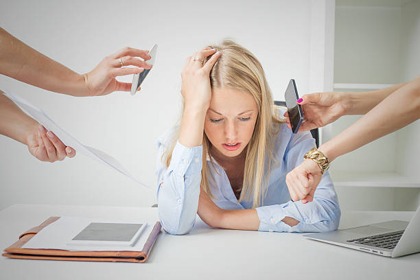 Woman overloaded with stuff at work Work issues: woman overloaded with stuff at work vascular bundle stock pictures, royalty-free photos & images