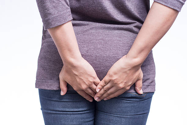 istock Woman Has Diarrhea Holding Her Butt on Isolated White Background 510232062