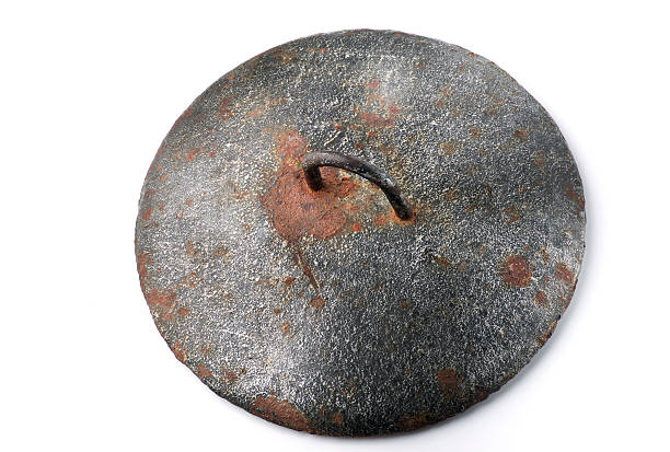 istock Old pan lid on white background. 510232382