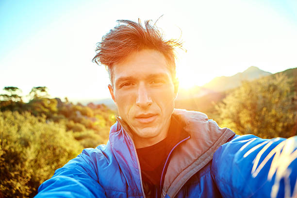 istock young man in the mountains 510235020