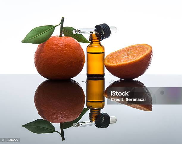 Tangerine Mandarin Essential Oil Bottle With Dropper Stock Photo - Download Image Now