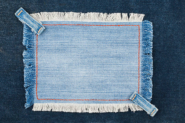 istock Frame with two straps jeans, lies on the dark denim 510239060