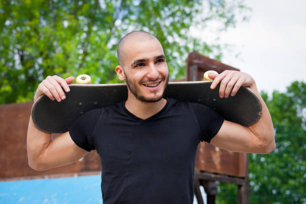 istock Man portrait with skateboard. 510240645