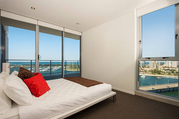 istock Beautiful bedroom with big windows 510240724