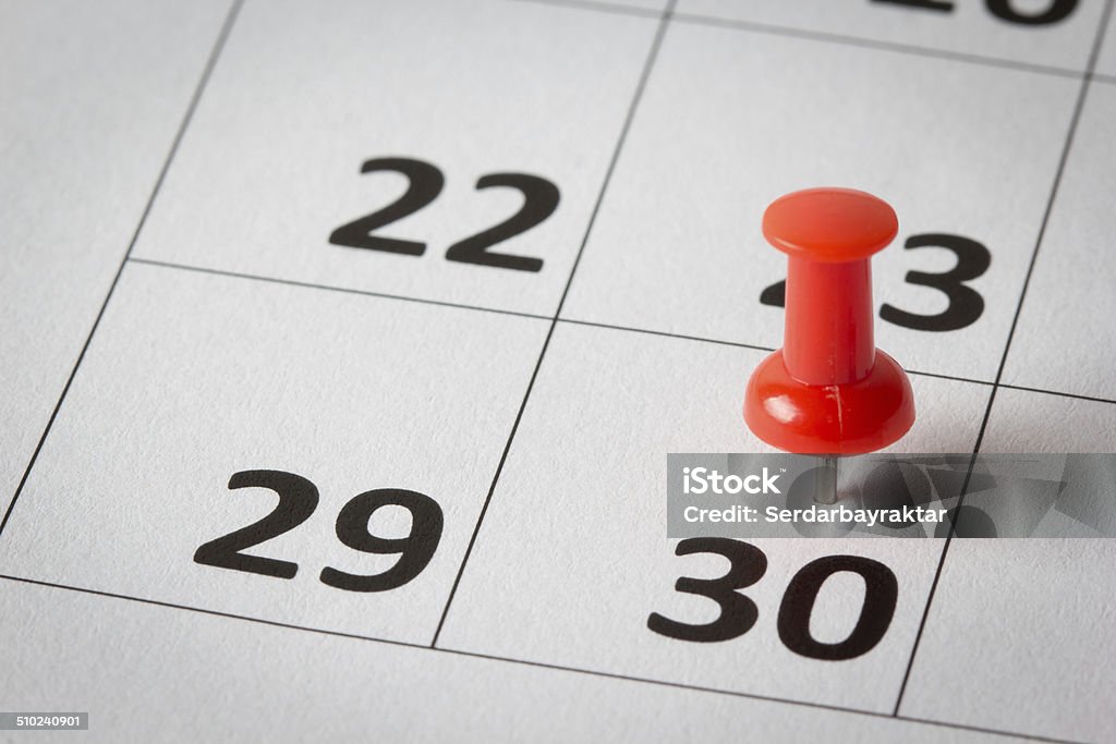 Appointments marked on calendar Concept image of a calendar with red push pins. Available in high resolution Number 30 Stock Photo