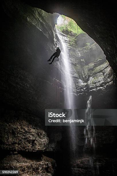 Thread The Needle Stock Photo - Download Image Now - Spelunking, Rappelling, Speleology