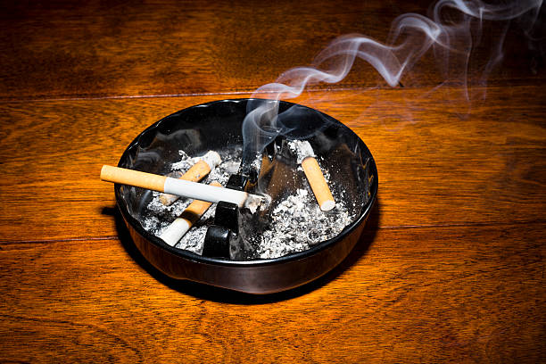 istock Smoking cigarette in ashtray 510242891
