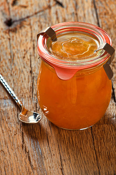 istock Melon jam in preserving jar with a spoon 510243449