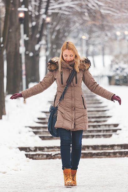 istock Pretty girl walking on ice 510245433
