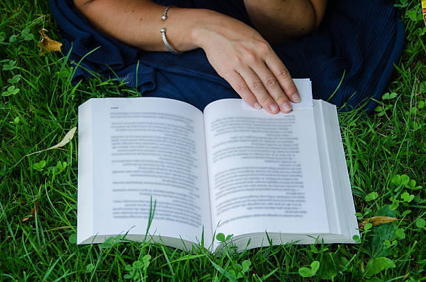 istock Reading in the nature 510245445