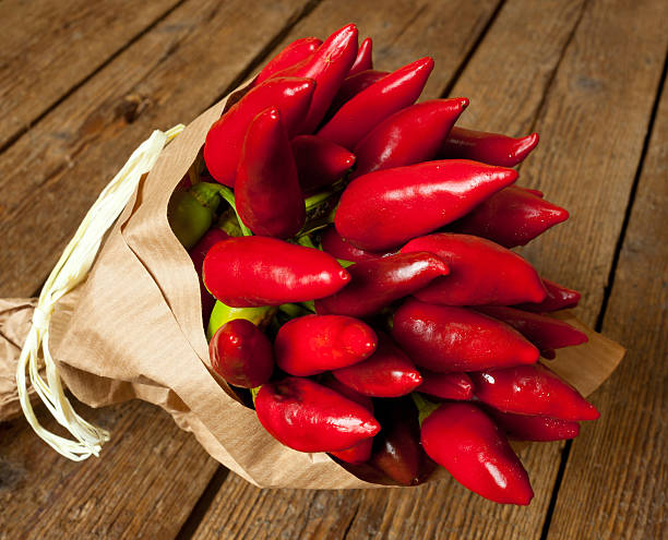 Bunch of red hot pepper Bunch of fresh small red hot pepper made in Salento, Puglia, Italy. spicery stock pictures, royalty-free photos & images