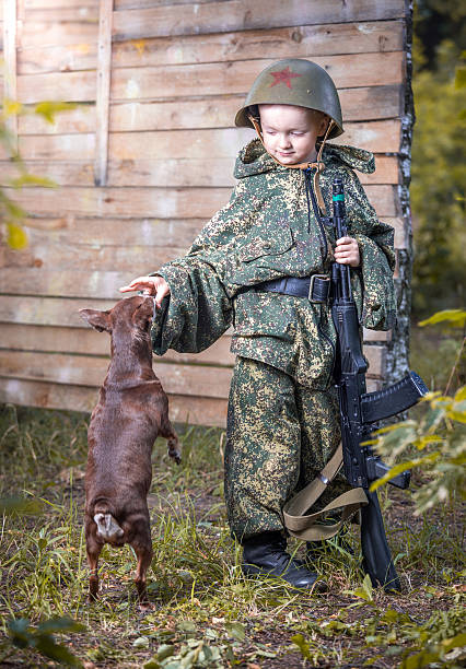 istock Soldier playing with dog 510266485