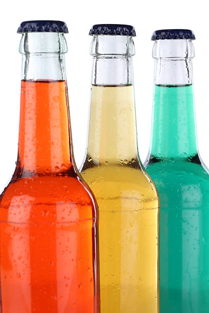 istock Soft drinks with lemonade in bottles isolated 510269165