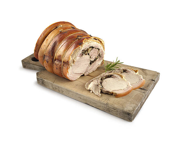 porchetta Roman roast pig on wooden cutting board asa animal stock pictures, royalty-free photos & images