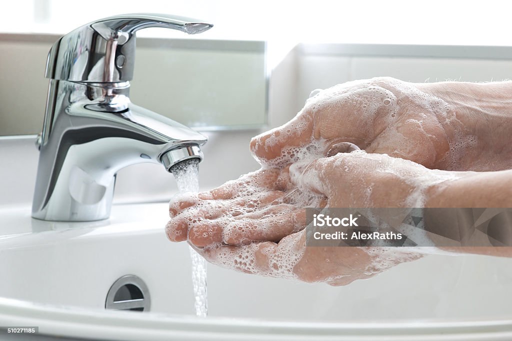 Washing hands Washing of hands with soap under running water Soap Sud Stock Photo