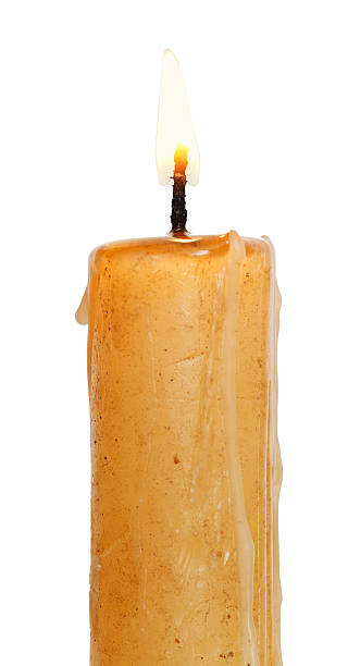 istock used burning candle close up isolated on white 510272135