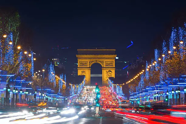 Avenue des Champs-Elysees with Christmas lighting leading up to the Arc de Triomphe in Paris, France