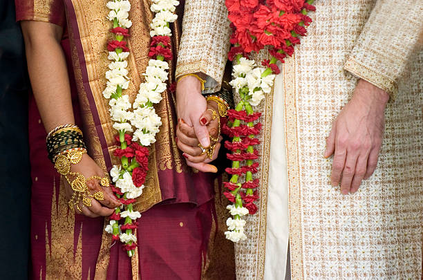 Wedding couple holding hands