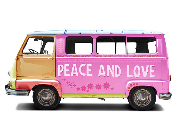 European manufacturing van decorated with flowers and hippies symbols of peace and love.