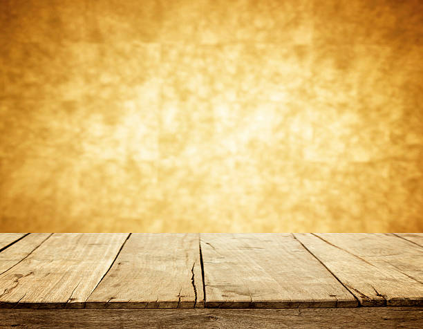 istock wooden and orange wall blur background 510286531