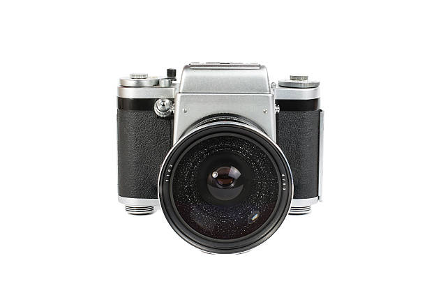 istock Old mechanical 50mm photo camera isolated on white background 510287515