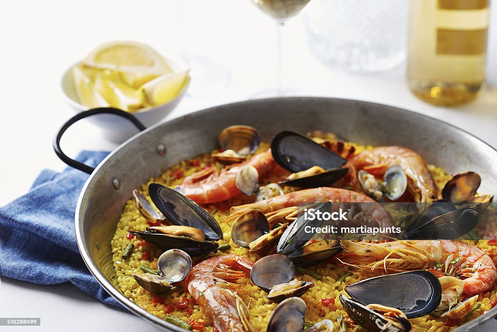 Typical spanish seafood paella Typical spanish seafood paella in traditional pan Paella Stock Photo