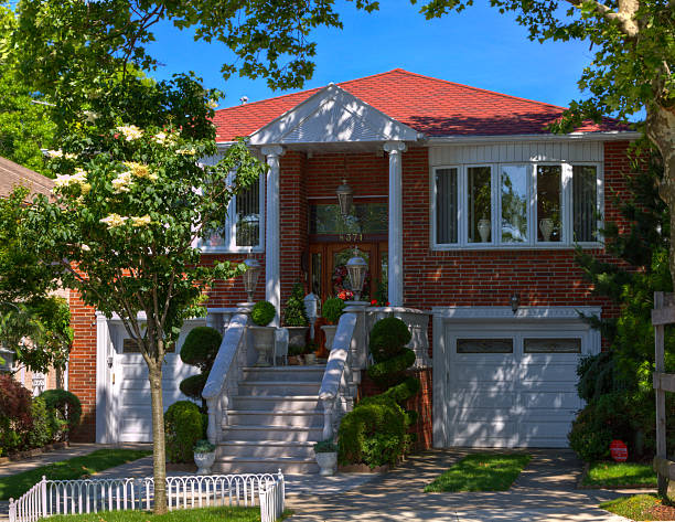 Luxury Brooklyn House, New York. Blue sky. Brooklyn, NY, USA - June 15, 2014: HDR (photorealistic) image of a Luxury House in Bay Ridge neighbourhood of Brooklyn, on a beautiful summer day. driveway colonial style house residential structure stock pictures, royalty-free photos & images