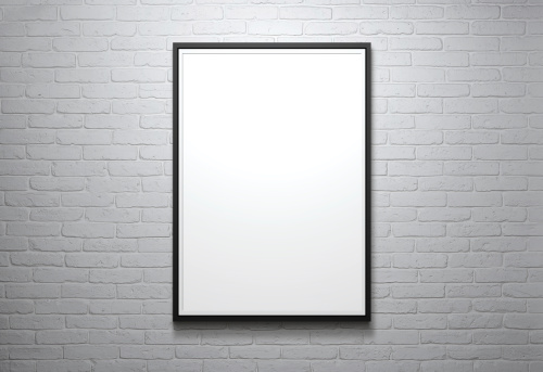 Blank picture frame at the brick wall with copy space and clipping path for the inside