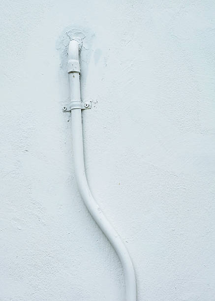 istock pipe system on the factory wall. 510291427