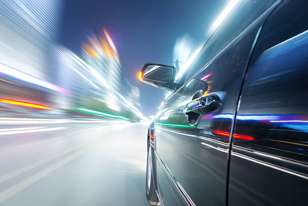 car on the road with motion blur background stock photo